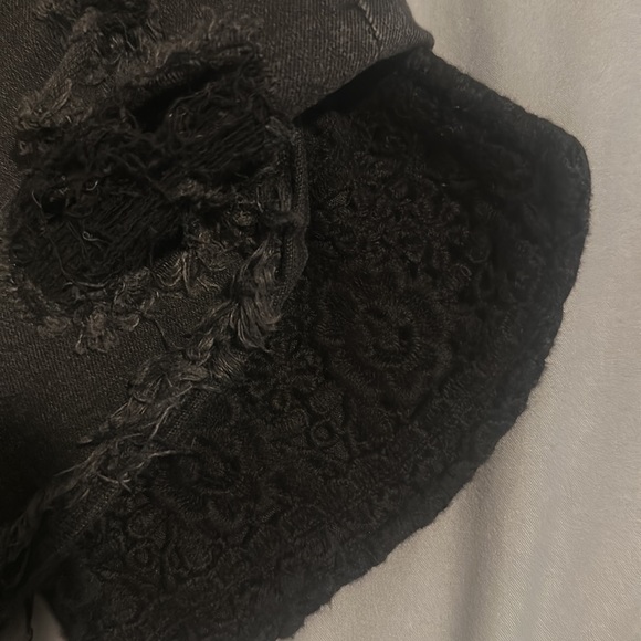 Distress black jean shorts. American Eagle.Floral lace exposed pockets. Stretchy - Picture 3 of 3